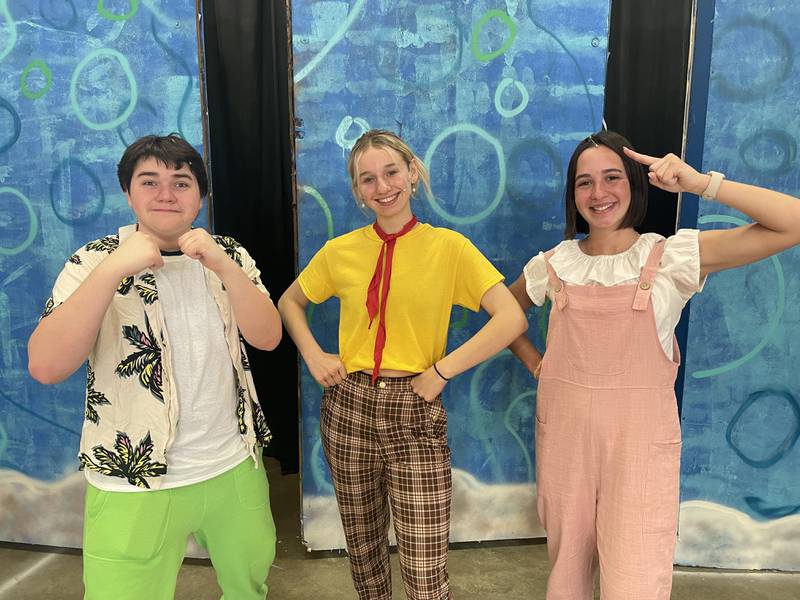 Gabriel Pauley as Patrick Star, Olivia Schurman as SpongeBob SquarePants, and Lili Drinkall as Sandy Cheeks are preparing to perform The SpongeBob Musical on April 5, 6 and 7 at Chadwick-Milledgeville School.