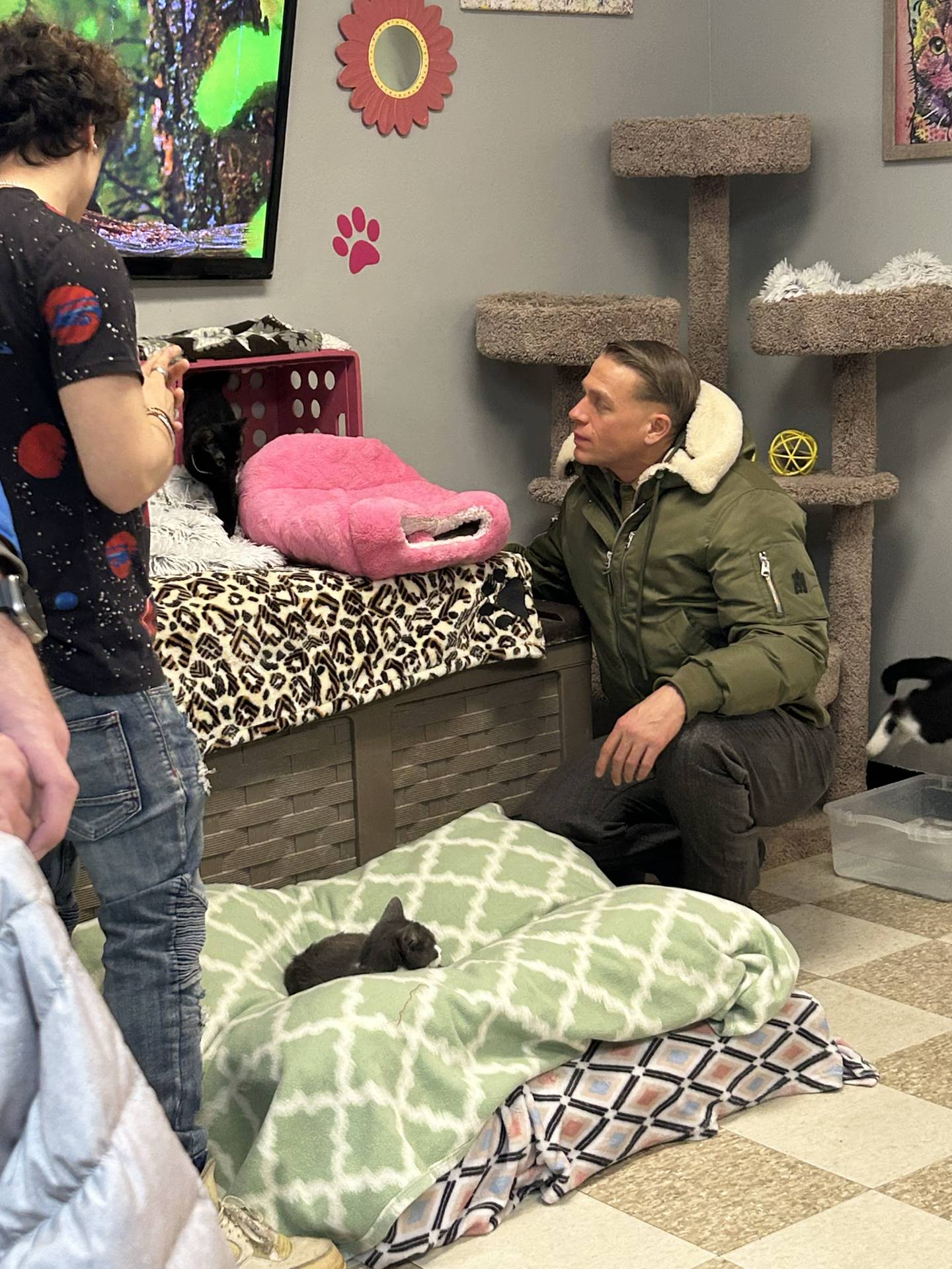 Charlie Hunnam, lead actor in the Netflix true-crime series, “Monster," visits cats at the River Valley Animal Rescue's Cat Oasis in Momence during a filming day.