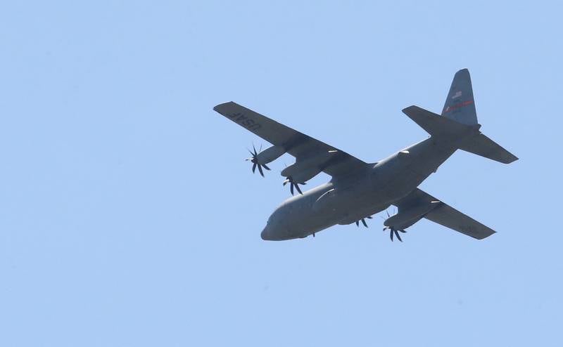 A C-130 flies overhead during the 10th annual TBM Avenger Reunion and Airshow on Friday, May 16, 2025 at the Illinois Valley Regional Airport in Peru.