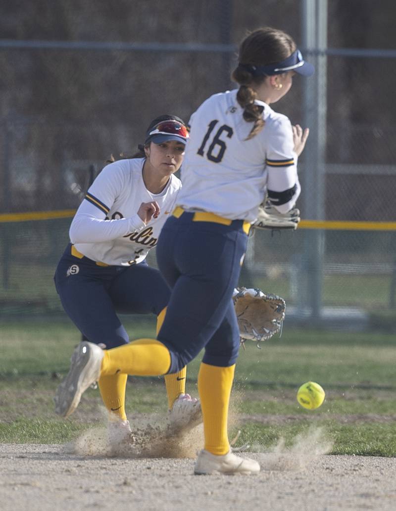 A hit drops between Sterling’s Lily Cantu (left) and Breanna Taylor in a game against Dixon Tuesday, March 24, 2026.