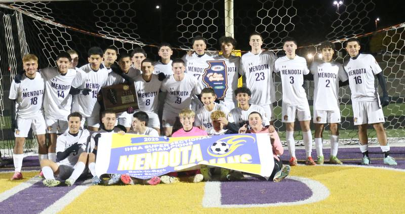 Members of the Mendota boys soccer team pose with the Class 1A Supersectional plaque after defeating Quincy Notre Dame during the Class 1A Supersectional game on Monday, Nov. 3, 2025 at Mendota High School.