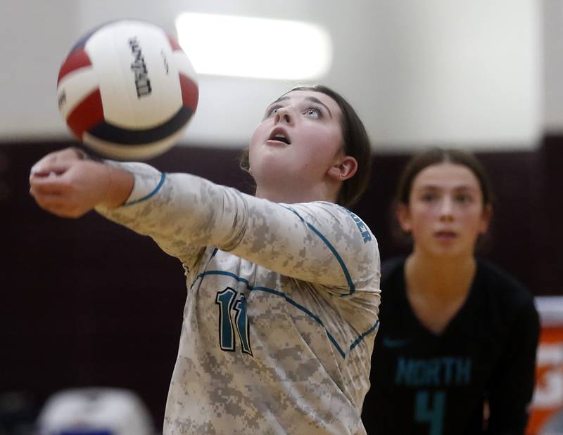Woodstock North's Madison Sofie bumps the ball during a Kishwaukee River Conference volleyball match against Richmond-Burton on Wednesday, Oct. 15, 2025, at the Richmond-Burton High School in Richmond.