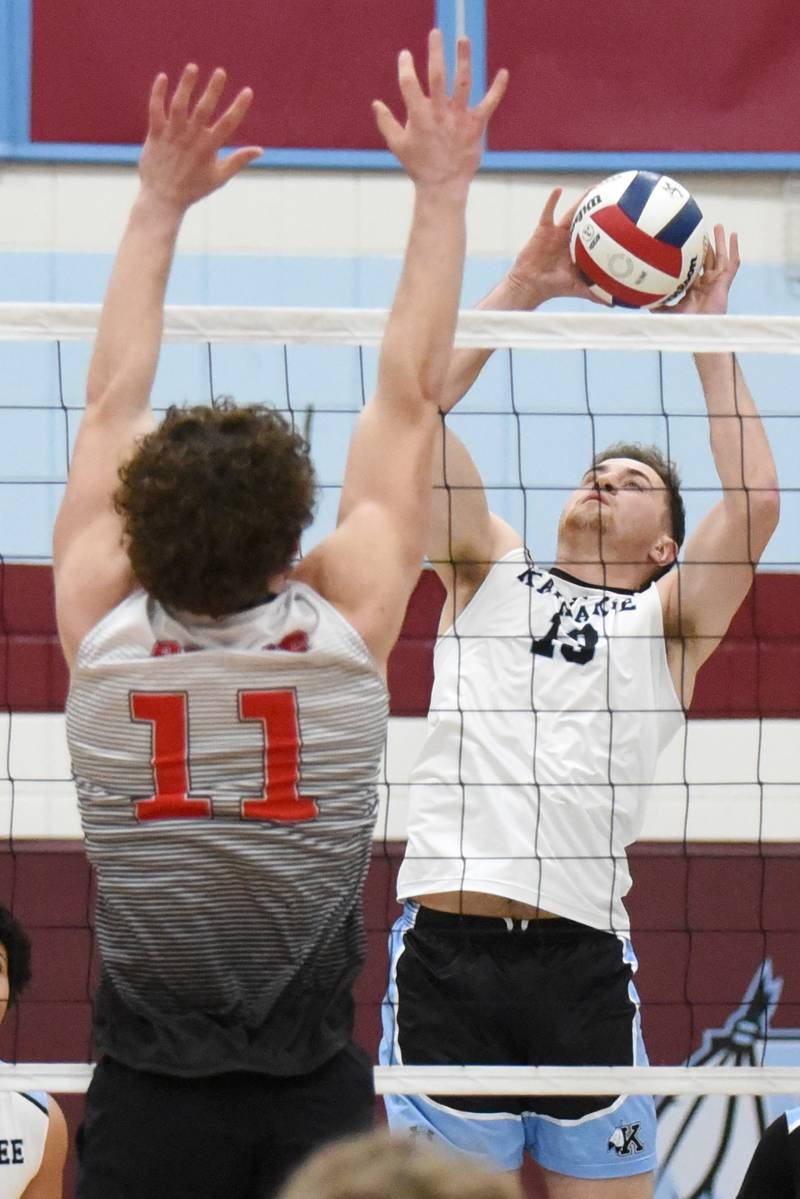 Kankakee's Eli Cunningham, right, looks to send the ball past Bradley-Bourbonnais' Jacob Berns during the All-City game at Kankakee Thursday, April 10, 2025.