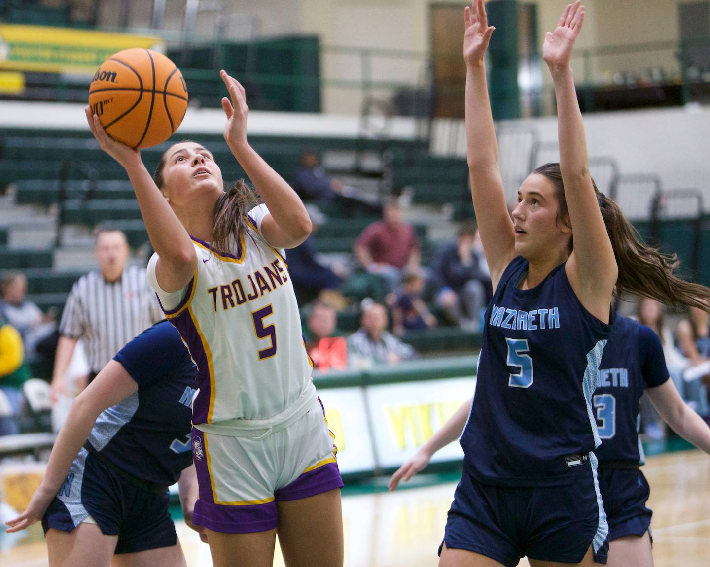 Downers Grove North's Campbell Thulin goes in for the shot against Nazareth during the Dave Yates Chicagoland Showcase on Saturday, Dec7,2024 at Fremd in Palatine.