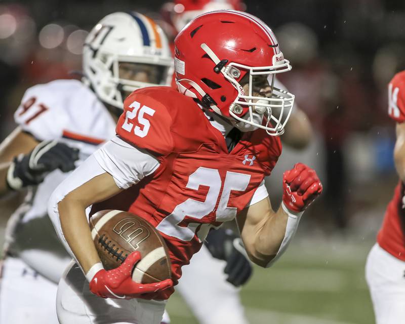 Naperville Central's Ryan Jacobson (25) runs with the ball during football game between Oswego at Naperville Central  on Friday, Aug 29, 2025  in Naperville.