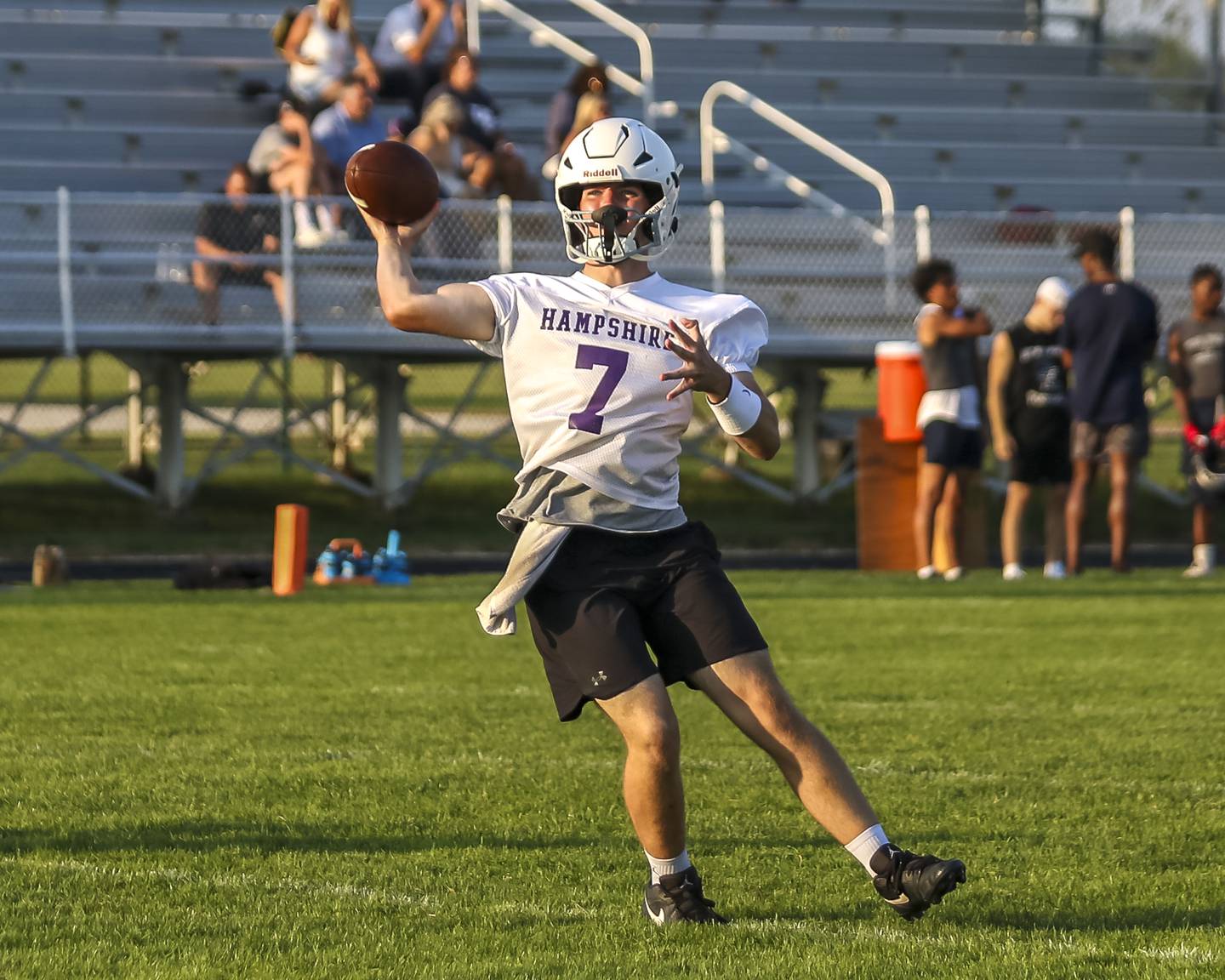 Hampshire's Max Jacobs makes an off balanced pass for a completion during the Kaneland 7 on 7 football tournament, July 22, 2025 in Maple Park.