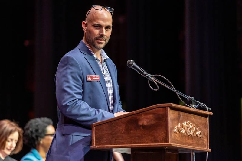 Rafael Ramirez, associate executive director at The Rialto Square Theatre, welcomes everyone to the Naturalization Ceremony in Joliet on April 17, 2025.