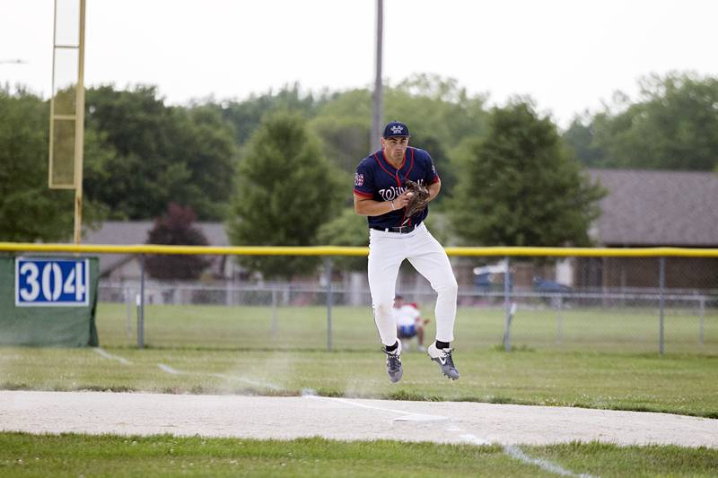 Tyler Willman of the Whiteside Wildcats semi-pro team fields a ball at first against Palmer Wednesday, July 19, 2023.
