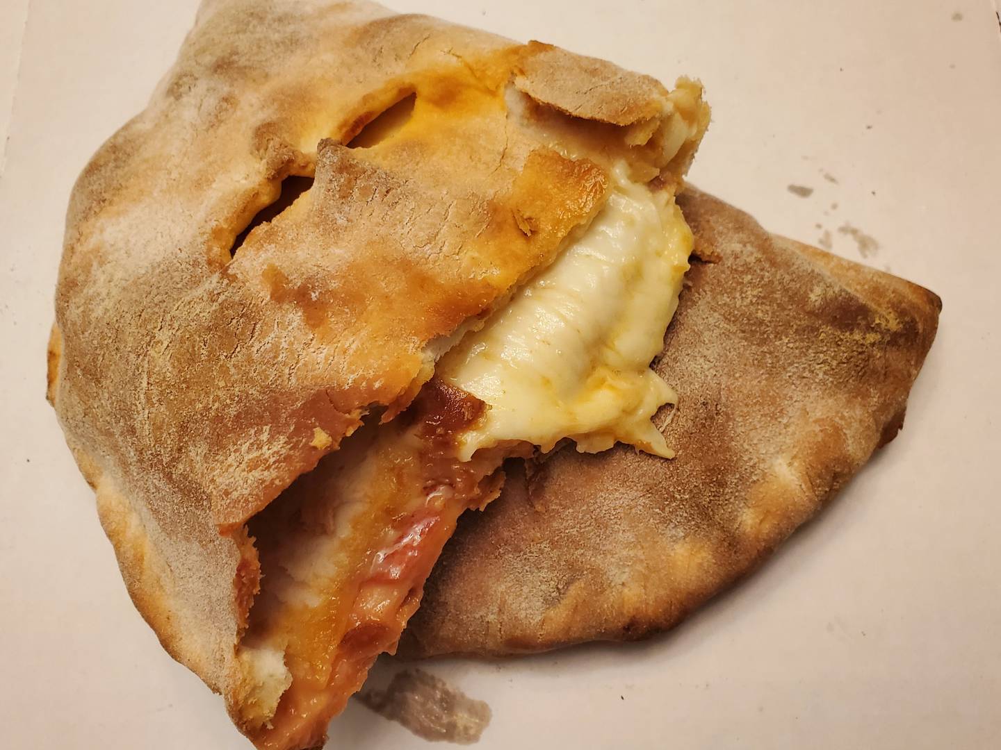 Aside from the traditional pizza, we also enjoyed a wonderful pizza pocket ($9.50). This specialty item contained everything that was great about the traditional item, but was wrapped entirely in a pocket of dough that was big enough to be an entire meal itself.