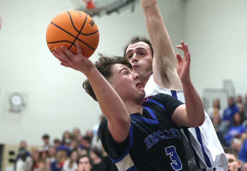 Hinckley-Big Rock's Austin Roop goes to the basket against Ida Crown’s Avi Okner  during their Class 1A sectional game Wednesday, March 5, 2025, at Somonauk High School.