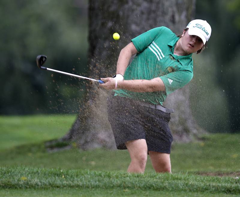 Crystal Lake South’s Tim Popovits out of the sand trap onto the10th green during the Fox Valley Conference Boys Golf Tournament Thursday, Sept. 21, 2023, at McHenry Country Club in McHenry.