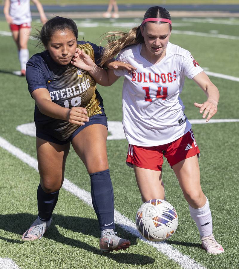 Sterling’s Yilana Molina fights for the ball against Streator’s Emma Robinson Friday, May 15, 2026, during the Class 2A regional soccer quarterfinal.