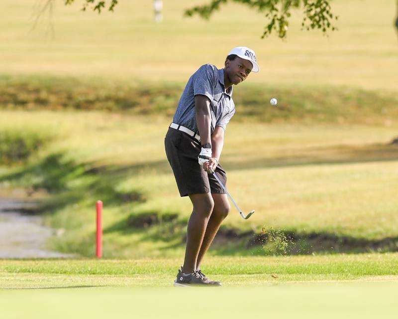 Jonah Powell of Plainfield South watches his chip shot during the Plainfield Central regional on Wednesday Oct. 1, 2025, held at Wedgewood Golf Course in Plainfield.