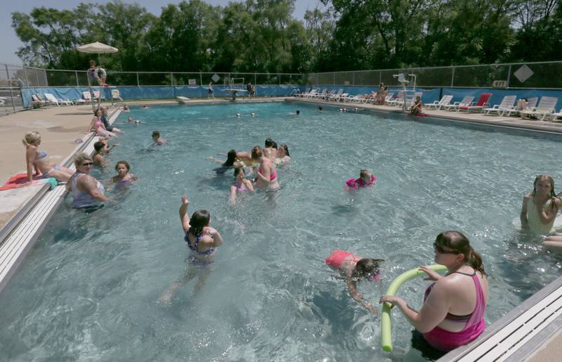 Swimmers beat the heat by splashing around in the Spring Valley Swimming Pool on Tuesday, June 14, 2022 at Kirby Park in Spring Valley.