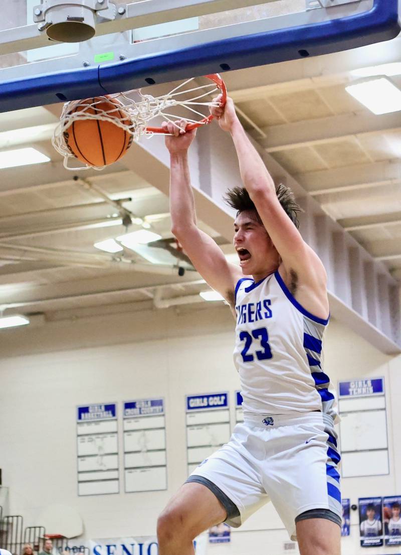 Princeton's Noah LaPorte slams the ball through in the fourth quarter of Saturday's game with. Byron at Prouty Gym. He scored 29 points to lead the Tigers to a 53-51, breaking the PHS all-time scoring record.