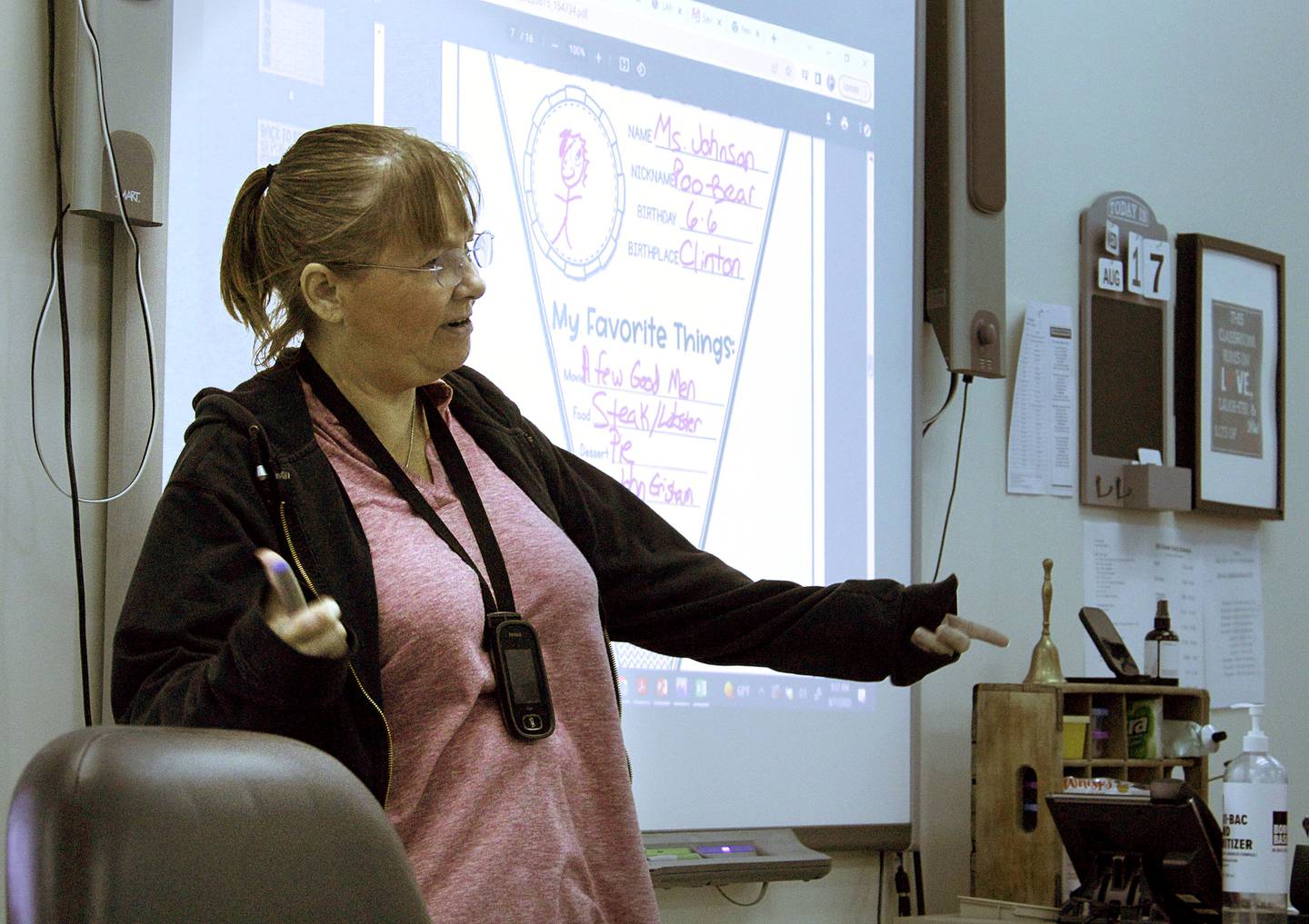 Jennifer Johnson, a teacher of 29 years experience, introduces herself to her class of sixth-graders at West Carroll Middle School on Wednesday. It's her first year as a sixth-grade instructor after being a special education specialist last year. The room's lighting is tinted to accommodate special education students.
