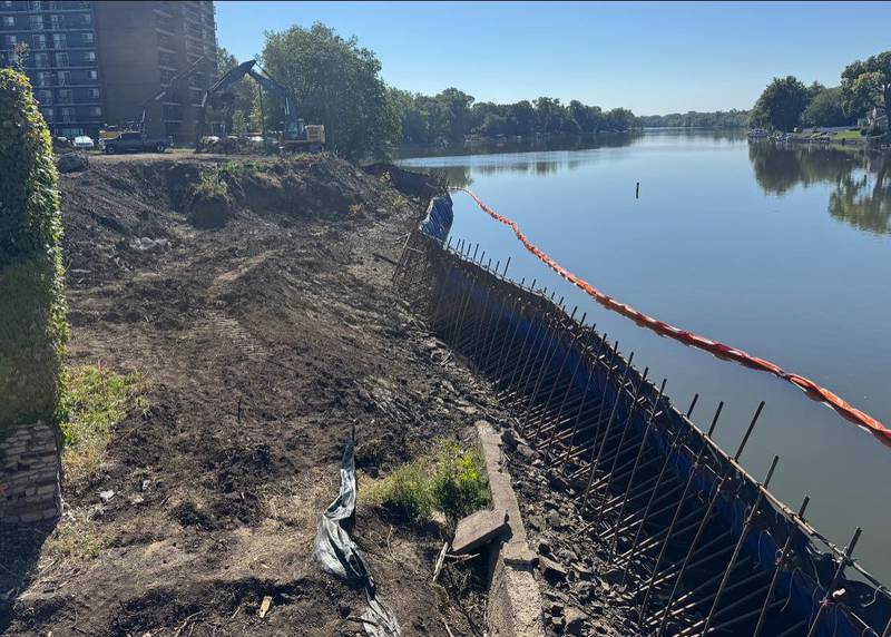 The portadam is shown creating a dry space for crews to build the boardwalk and riverfront amenities at the East Riverwalk in Kankakee on Sept. 2, 2025.