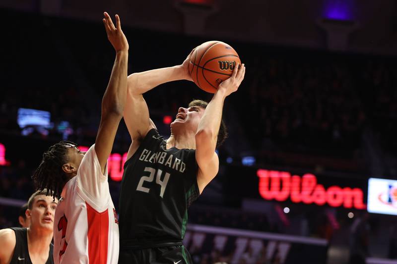 Glenbard West’s Paxton Warden battle for the basket against Bolingbrook in the Class 4A semifinal at State Farm Center in Champaign. Friday, Mar. 11, 2022, in Champaign.