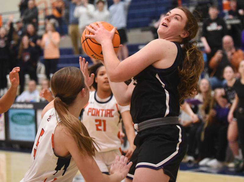 Manteno's Emily Horath attempts to beat the buzzer with a potential game-tying shot during the IHSA Class 2A Pontiac Sectional championship against Pontiac Thursday, Feb. 26, 2026.