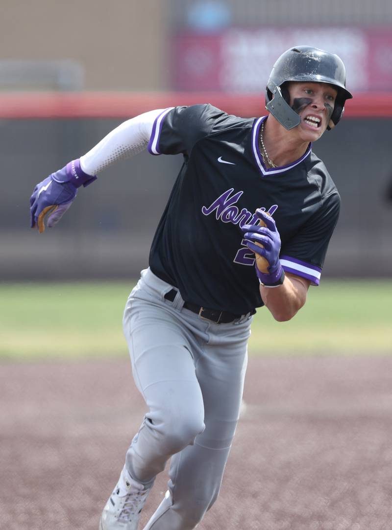 Downers Grove North's George Wolkow (24) runs to third during the IHSA Class 4A baseball regional final between Downers Grove North and Hinsdale Central at Bolingbrook High School on Saturday, May 27, 2023.