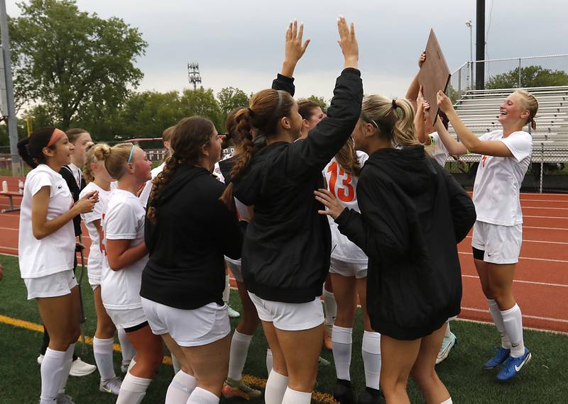 Crystal Lake Central players celebrate defeating St. Viator in the IHSA Class 2A Deerfield Sectional championship girls soccer match on Friday, May 30, 2025, at Deerfield High School.