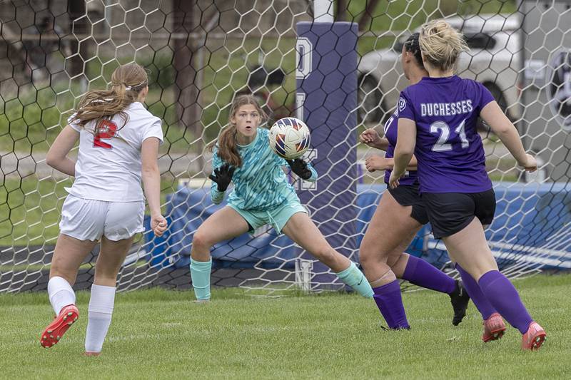 Dixon goalkeeper Zoey Williams eyes the ball on a shot by Oregon’s Jaqlynn Rufer Friday, May 1, 2026. The ball just slipped through the hands for the first goal of the game.