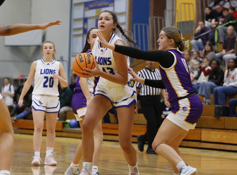 Lyons' Emma O'Brien (43) drives to the basket during the girls varsity basketball game between Downers Grove North and Lyons Township on Saturday, Jan. 11, 2025 in La Grange.