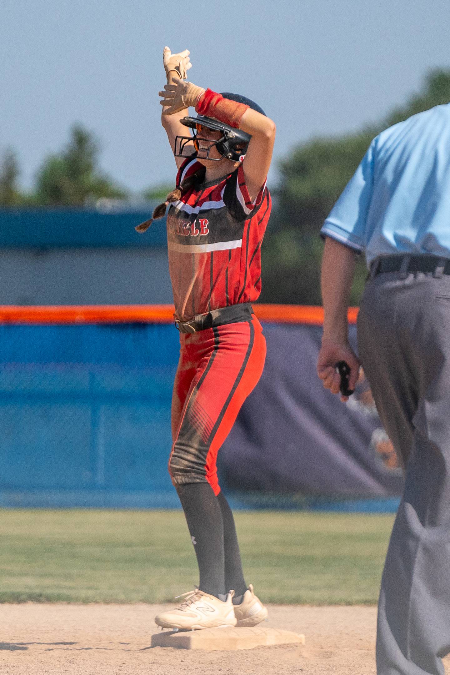 Yorkville's Makenzie Sweeney (4) “dubs” in celebration after driving in a run against Wheaton Warrenville South during the Class 4A Oswego softball sectional final game between Yorkville and Wheaton Warrenville South at Oswego High School on Friday, June 2, 2023.