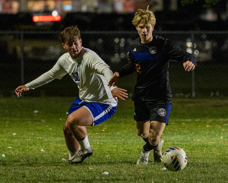 (32) of Somonauk/Leland/Newark dribbles ball as Austin Roop (10) of Hinckley-Big Rock trails during the Little Ten Conference Championship match on Thursday, Oct. 9, 2025 at Hinckley-Big Rock School in Hinckley.