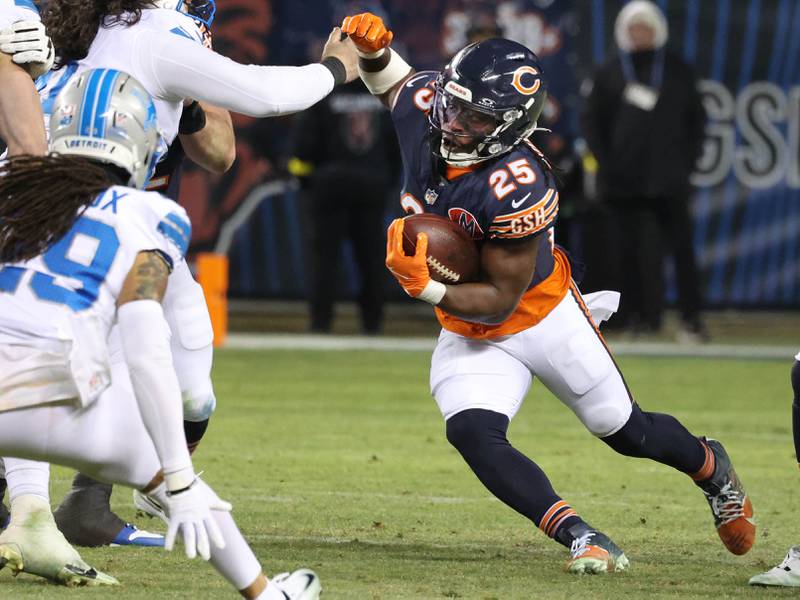 Chicago Bears running back Kyle Monangai finds a hole in the Detroit Lions defensive line during their game Sunday, Jan. 4, 2026, at Soldier Field in Chicago.