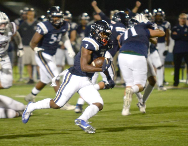 Immaculate Conception's Denzell Gibson runs the ball during their home game against Wheaton Academy Friday Sept 30, 2022.