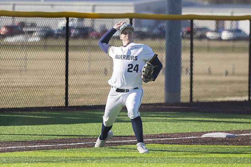 Sterling’s Braden Hartman throws from third base for an out Monday, March 27, 2023 versus Lasalle-Peru.