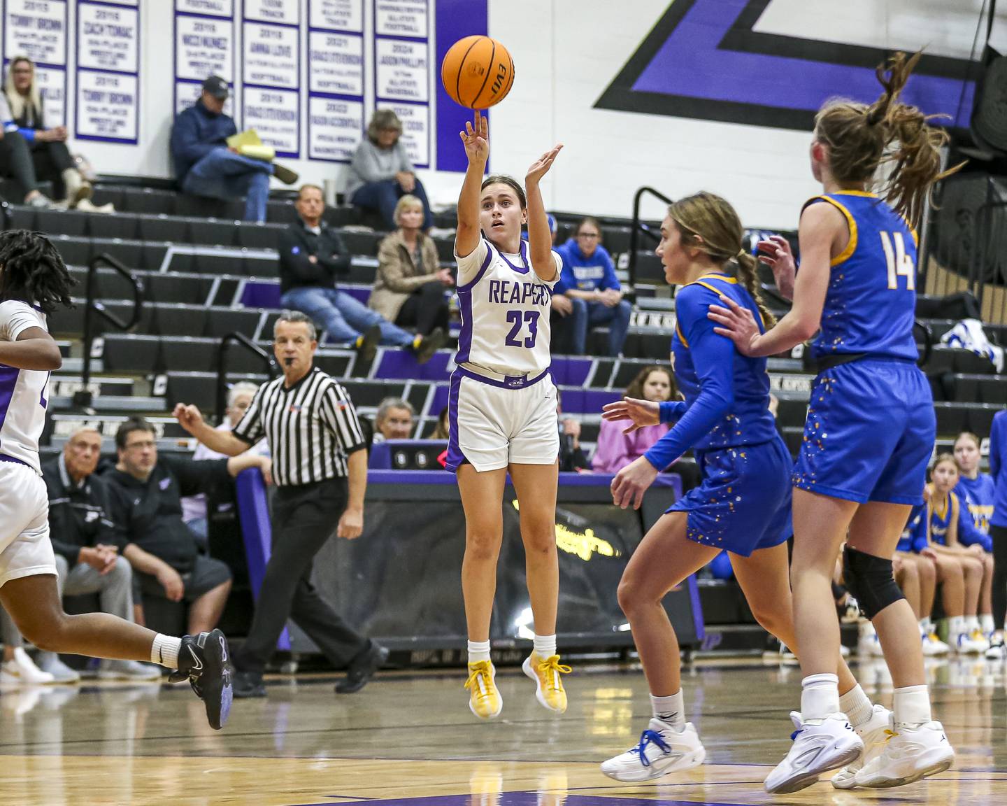 Plano's Josie Larson (23) shoots a three during their basketball game between Johnsburg at Plano, Monday Dec 16, 2024 in Plano.