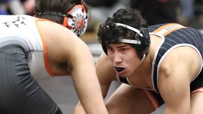 Boys wrestling: DeKalb’s Alan Izaguirre surges to third place, one of eight Barbs to qualify for sectional