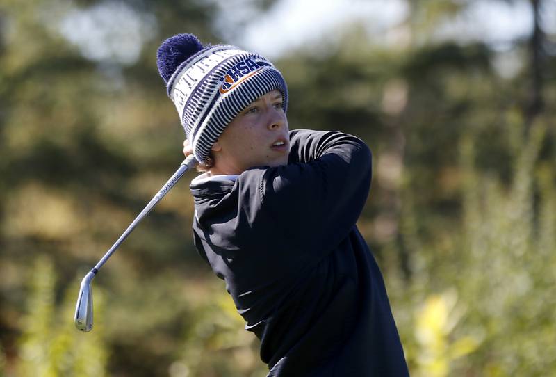 Crystal Lake Central’s Jack Brice watches his tee shot on the first hole during the IHSA 2A Marengo Regional Golf Tournament Wednesday, Sept. 28, 2023, at Marengo Ridge Golf Club.