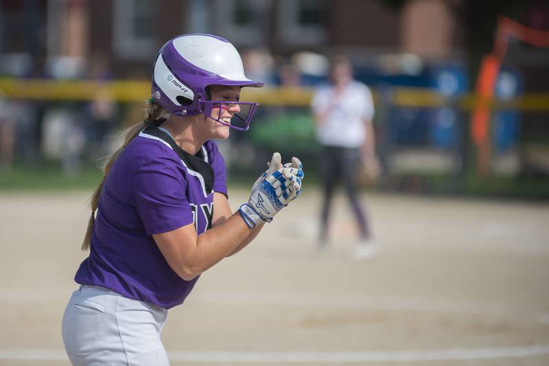 Dixon's Sam Tourtillott celebrates a triple in the first inning of the Duchesses' game against Rochelle Tuesday, May 24, 2022.