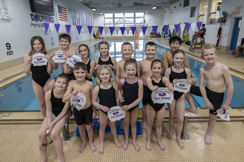 The Dixon Dolphins YMCA swim team will be sending 14 athletes to compete at the state tournament March 8-10, 2024. Pictured: Taylor Shiaras (back row, left), James Catt, Charlotte Kelly, Paige Burrs, Will Hayes, Henry Hayes, Jamie Yindeeroop. Front row: Maddie Engle (left), Ben Hayes, Wynnie Brown, Glory Rogers, Kaydence Lahey, Maelynn Brown and Liam Spencer.