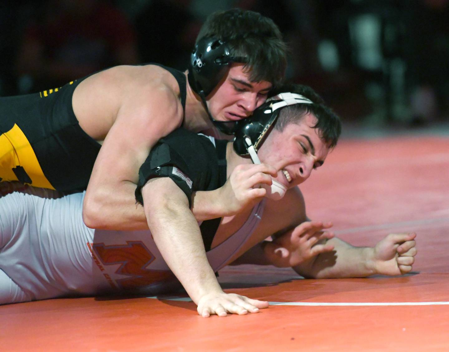 Woodstock Marian's Max Astacio tries to break the grip of Riverdale's Collin Altensey during the championship at 160 pounds at the 1A Oregon Wrestling Sectional on Saturday. Altensey won the match.