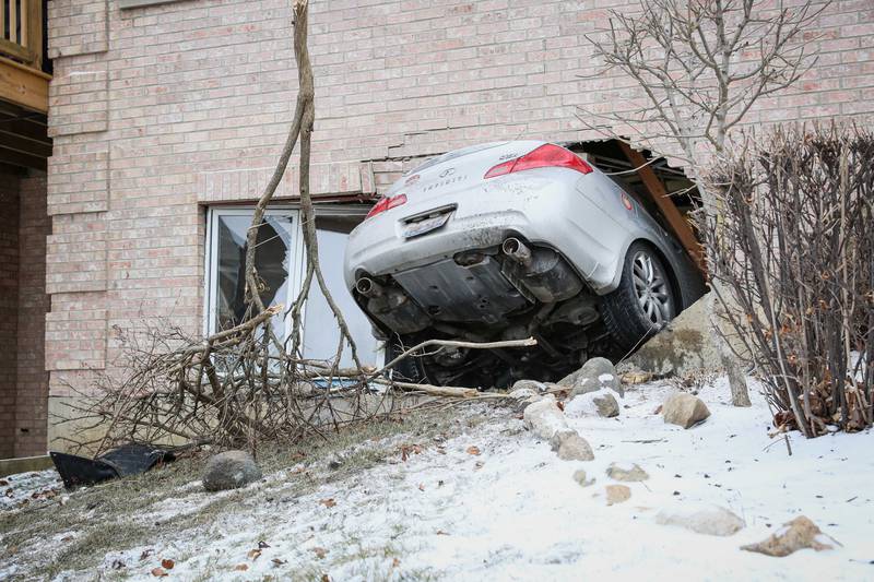 A car ended up almost completely inside a  house following a crash Wednesday, Jan. 22, 2025, on the 400 block of Ridge Court in Lake in the Hills.