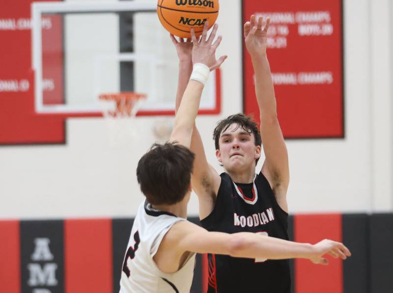 Woodland's Nolan Price has his shot blocked by Indian Creek's Jason Brewer during the Class 1A Sectional Semifinal game on Wednesday, March 4, 2026 at Amboy High School.
