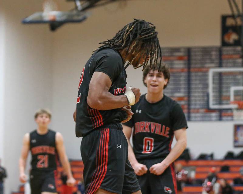 Yorkville's Braydon Porter (22) reacts after scoring on a drive to the basket during their Class 4A Naperville North Regional final basketball game between Yorkville at Downers Grove South, Feb 27, 2026 in Naperville.