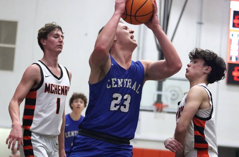 Burlington Central’s Jacob Johnson works under the hoop in varsity boys basketball on Tuesday, Feb. 4, 2025, at  McHenry High School  in McHenry.