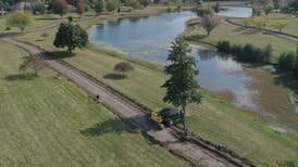 Photos: New 10-foot path replaces old walkway around Baker Lake in Peru