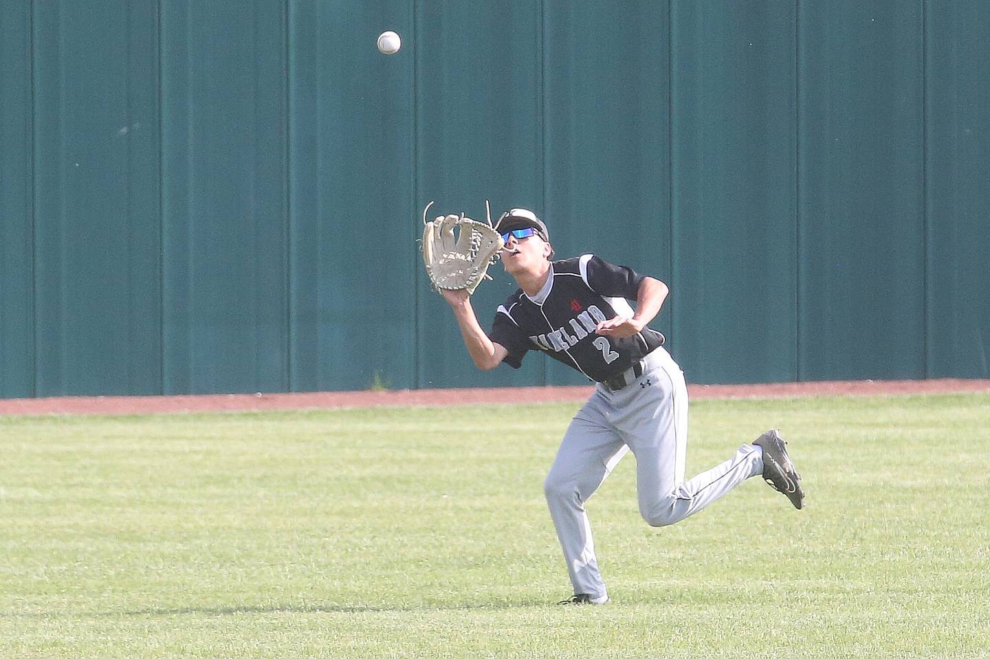 Kaneland's Antonio Villanueva makes a catch on the run against L-P on Tuesday, May 13, 2025 at Huby Sarver Field at the L-P Athletic Complex in La Salle.