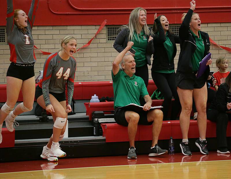 L-P head coach Mark Haberkorn reacts  with players and assistant coaches after getting his 1000th career win against Ottawa on Tuesday, Oct. 18, 2022 at Kingman Gymnasium in Ottawa.