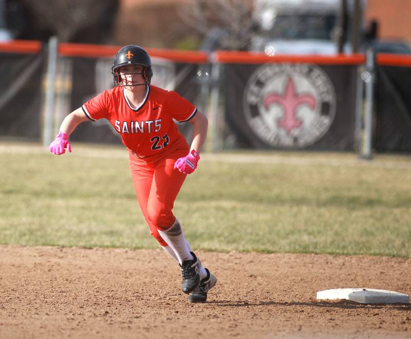St. Charles East's Lexi Majkszak takes off from second base during a game against Downers Grove North on Friday, March 28, 2025 in St. Charles.