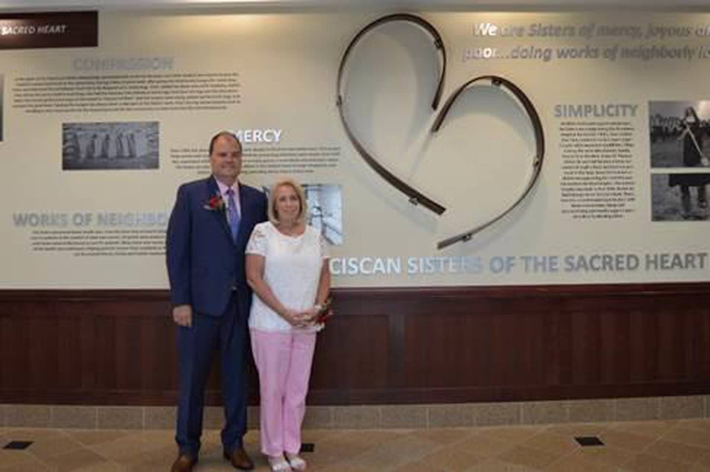 Tom and Michele Vana honored the Franciscan Sisters of the Sacred Heart, the founding congregation of AMITA Health Saint Joseph Medical Center, with a legacy wall prominently displayed within the medical center.