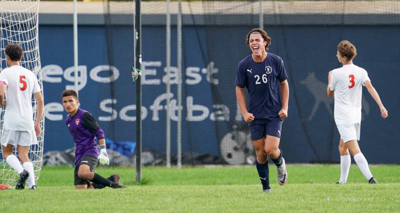 Oswego East's Josh Lopez (26) reacts after scoring a goal against Oswego during a soccer match at Oswego East High School on Tuesday, Sept. 26, 2023.