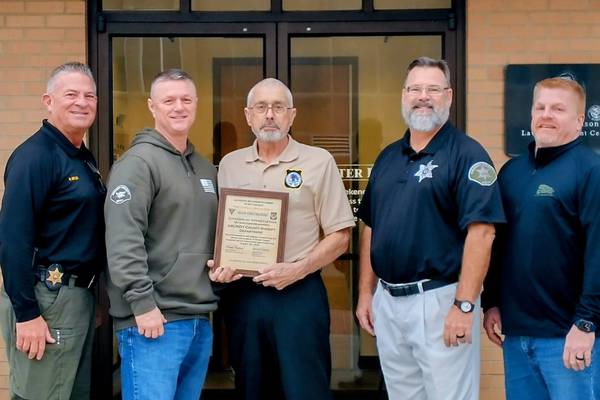Blue Chevaliers present certificates of appreciation to Morris, Grundy County police 