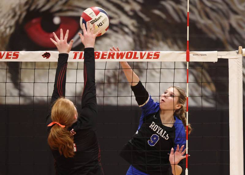 Hinckley-Big Rock's Julianne Miceli spikes the ball by Indian Creek's Makayla Bateman during their Class 1A regional play-in game Monday, Oct. 28, 2024, at Indian Creek High School in Shabbona.